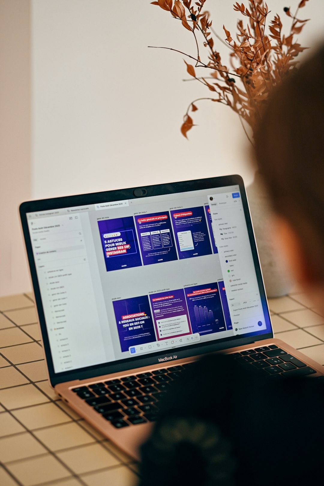 brand-03 person-looking-at-a-laptop-screen-with-presentation-slides-j4leerskc-0